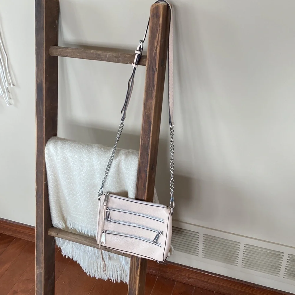 Rebecca Minkoff crossbody bag in a pale pink. Great summer bag! Zipper detail!